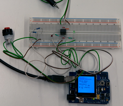 set-up on a breadboard with a dual optocoupler, some LEDs and a FREEDUINO
