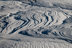 , Windblown snow drifts created icy waves. Abstract Formation, Engadin, Graubünden, Snow, Switzerland, Waves of Ice, Winter