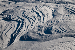 , Windblown snow drifts created icy waves. Abstract Formation, Engadin, Graubünden, Snow, Switzerland, Waves of Ice, Winter