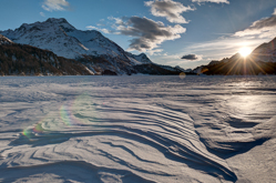 , Piz Margna and Wind sculpted snow fields on Lej da Segl. Abstract Formation, Engadin, Graubünden, Snow, Switzerland, Waves of Ice, Winter