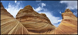 The Wave at Coyote Buttes, Paria Canyon and Vermilion Cliffs Wilderness area, The Coyote Buttes were formed mainly through the power of eroding winds. Wind brought in the layers of sand of various colors, later these layers petrified and now are eroded by wind again.<br>An amazingly special place worthwile visiting. Access is limited to 20 persons a day. A hiking permit is required. Inquire at the Ranger Station., 2006 / 04_23 The Wave, Page, United States of America, The Wave, Coyote Buttes South, Paria Canyon, Vermilion Cliffs, Wilderness Area, Page, Kanab, petrified Sand Dunes, Wind, Erosion